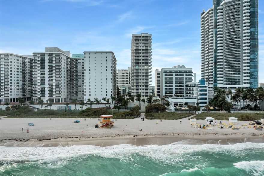 This exceptional beachfront corner unit offers breathtaking views of the beach and city from three balconies, intercoastal. Fully remodeled with a renovated kitchen that seamlessly flows into the dining room and a bar area equipped with two wine coolers. New appliances, wash & dryer inside the unit. Master suite bath, and guest bath tastefully contemporary remodeled. Located in Miami Beach, surrounded by boutiques, restaurants, and coffee shops, it is a direct oceanfront adjacent to the boardwalk. The building offers privacy, with only three units per floor. Amenities include a private pool, picnic area with BBQ facilities, 24-hour security, and underground designated parking. Walking distance from Miami Band Shell & Fountain Blue.