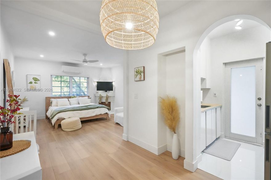 Reserves and 40 year recertification done! A Spacious and charming studio with over 580 sqft featuring: high ceilings, art deco fireplace, washer/dryer in-unit, custom built cabinetry, recently renovated bathroom, new luxury vinyl floors, new appliances, new central A/C unit & more. Ample closet/storage space throughout the unit. Parking is street parking (there is almost always parking available in front of the building).  Gated building located on a quiet, tree-lined one way street just a block from Flamingo Park. Centrally located in SoBe. Just blocks from the beach, Lincoln Road, top-rated restaurants and more.