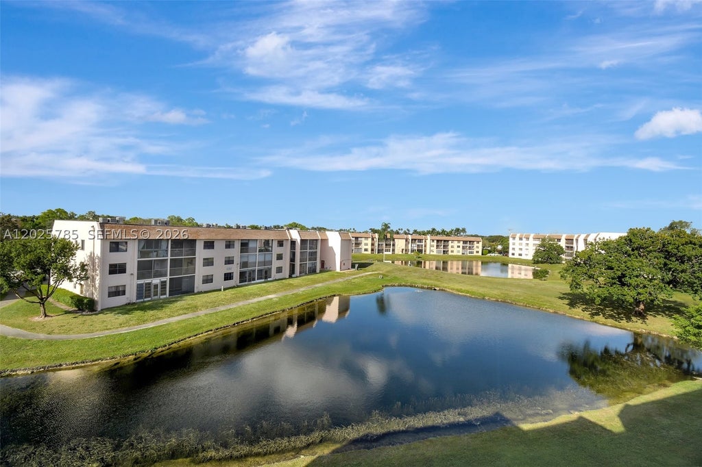 Photo of 10145 Sunrise Lakes Blvd #403, Sunrise, FL 33322 (MLS # A12025785)