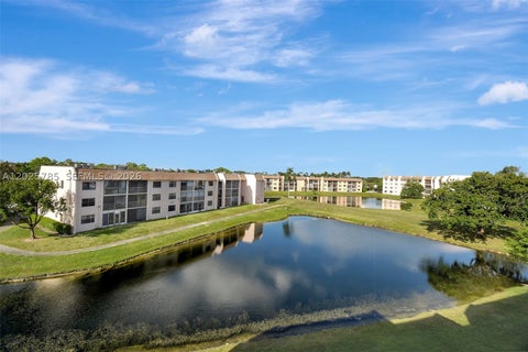 Photo of 10145 Sunrise Lakes Blvd #403, Sunrise, FL 33322 (MLS # A12025785)