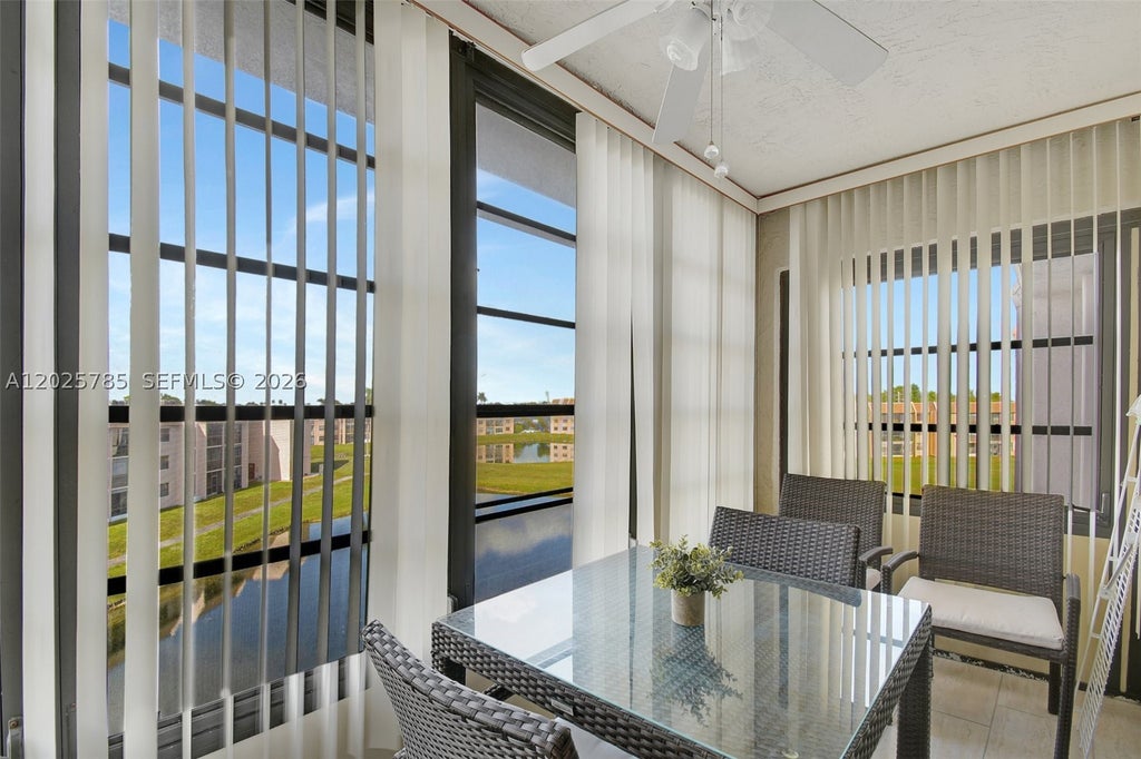 Photo of 10145 Sunrise Lakes Blvd #403, Sunrise, FL 33322 (MLS # A12025785)
