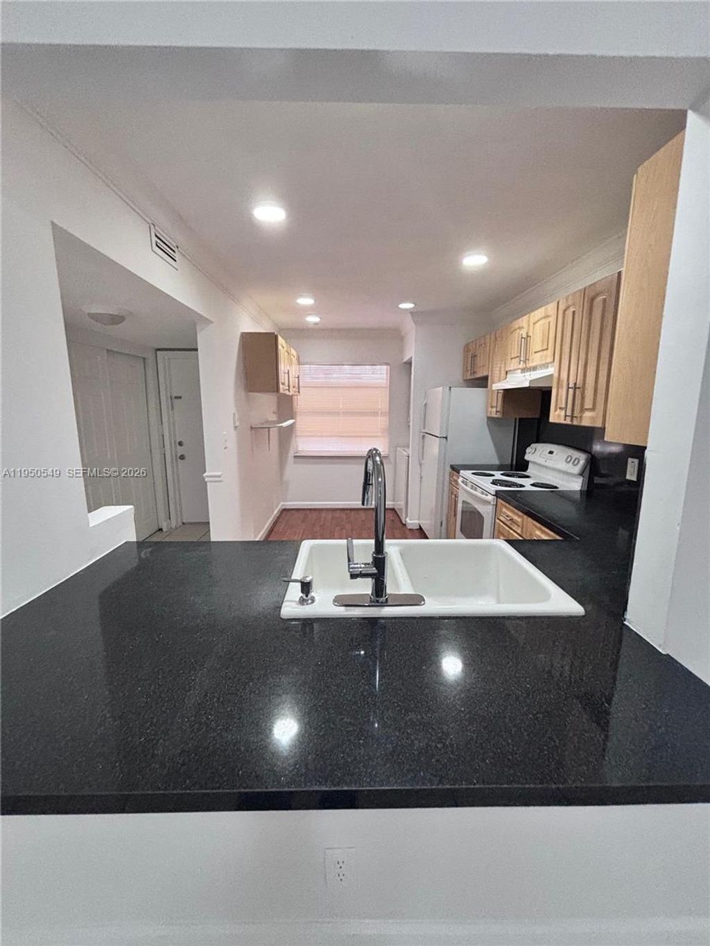 Photo of 430 Commodore Dr #104, Plantation, FL 33325 (MLS # A11950549)