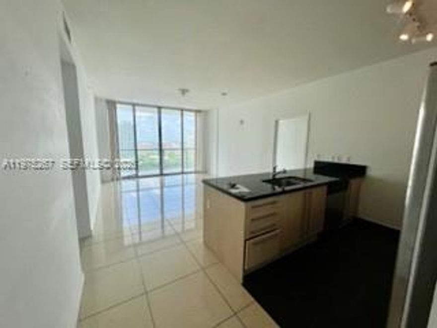 Spectacular High floor fully tiled 2BR/2BA with Unobstructed Water Views. C1 Model. Breath-taking views of city. Big Balcony extends from every room. H9-foot-plus ceiling floor to ceiling glass. Gourmet kitchen with S.S appliances, imported granite counter-tops and back-splash, European-styled cabinetry, ample bedrooms. Best parking space on first level. Enjoy the resorts amenities like: 2 Pools, Gym, Clubroom, Kids playroom, Pool tables, Ping pong, Spa, Valet, 24hr security. Great location! Close to Mary Brickell Village, Next 2 Metro & Metro mover, and Brickell City Center. Tenant occupied until 5/14/26.