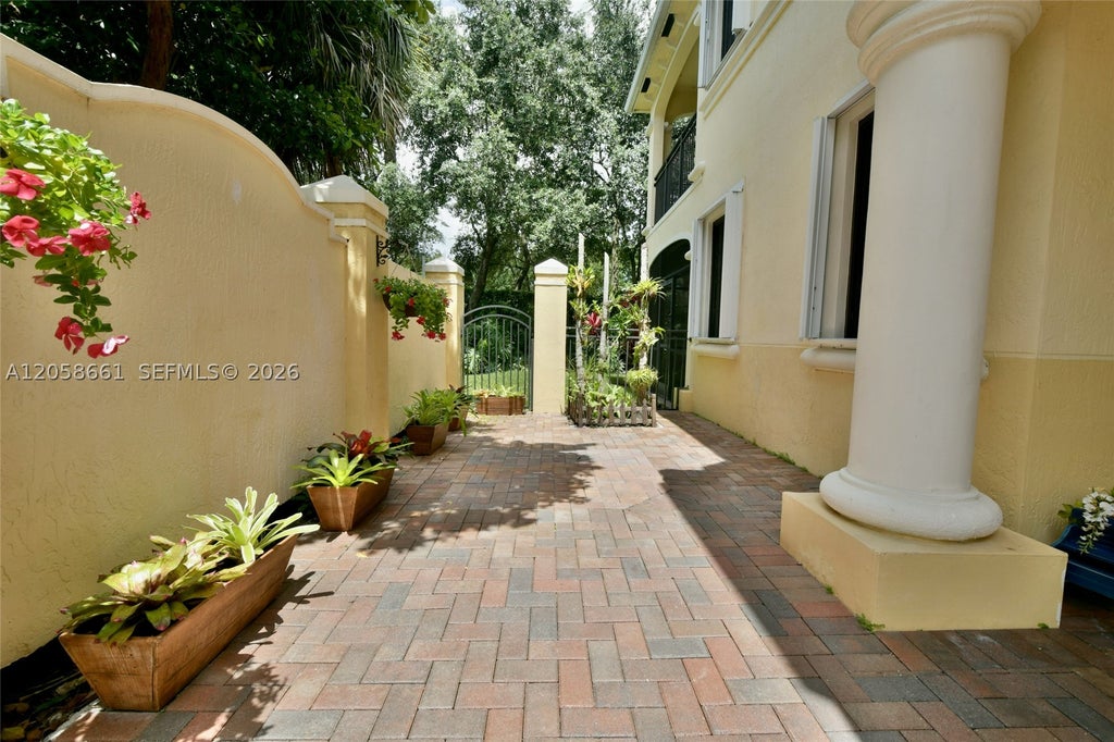 Photo of 1515 Passion Vine Cir #2-1, Weston, FL 33326 (MLS # A12058661)