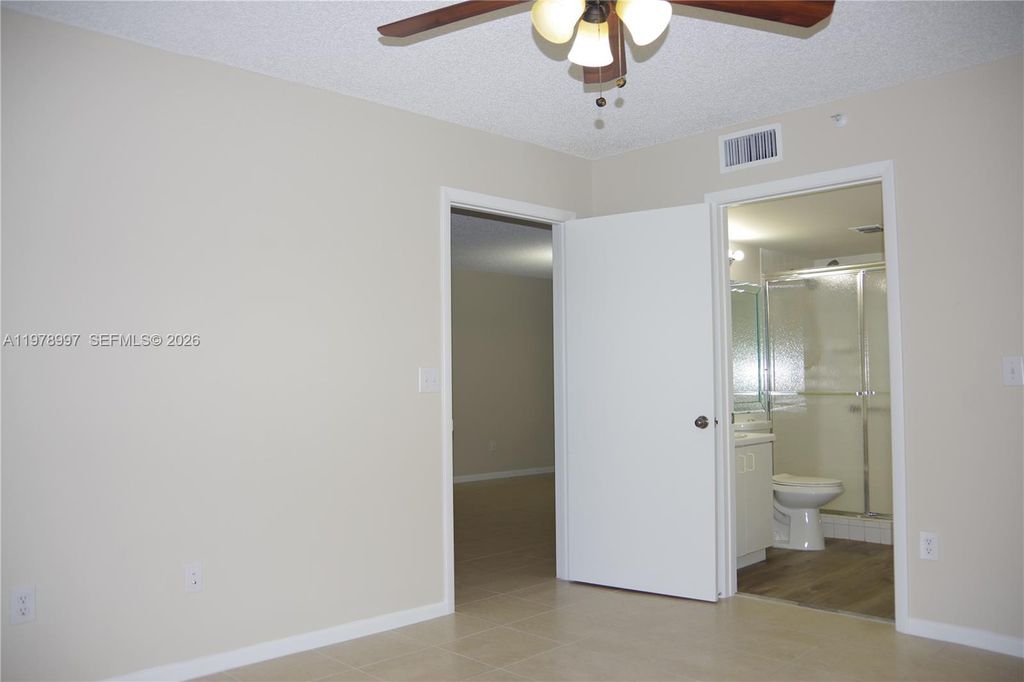 Photo of 9511 Weldon Cir #G315, Tamarac, FL 33321 (MLS # A11978997)