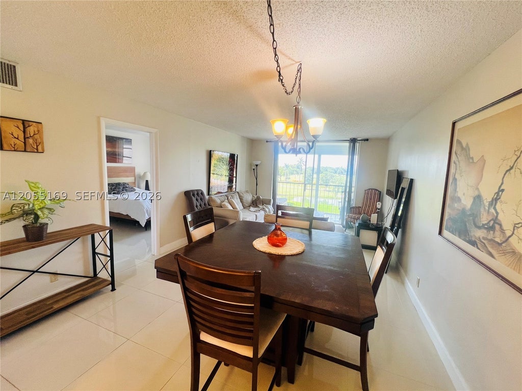 Photo of 8900 Washington Blvd #409, Pembroke Pines, FL 33025 (MLS # A12055169)