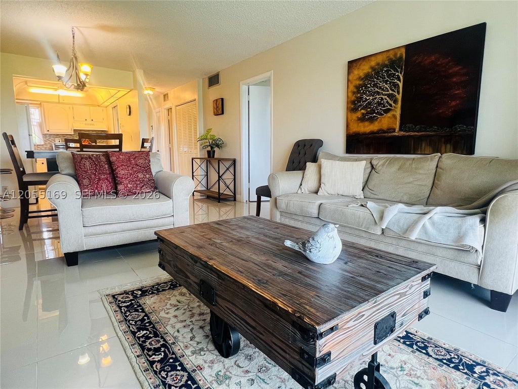 Photo of 8900 Washington Blvd #409, Pembroke Pines, FL 33025 (MLS # A12055169)