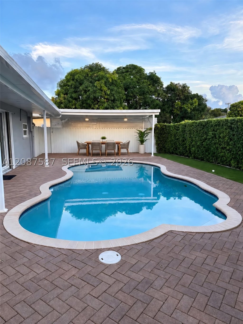 Photo of 7730 NW 42nd St, Hollywood, FL 33024 (MLS # A12087587)
