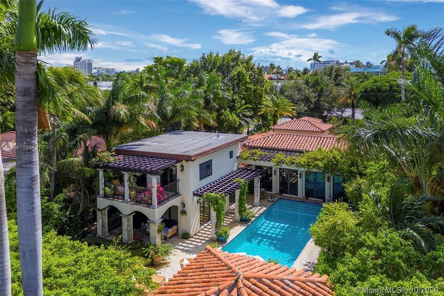 Private Tuscan garden oasis on guard-gated Sunset IV, located just steps away from the bustling Sunset Harbour neighborhood. Soaring vaulted wood ceilings and views of your own secret garden adorned by bougainvillea greet you as you enter this exquisite waterfront residence. Bright and open true chef’s kitchen w/ wine fridge, Subzero and Bosh appliances & brand-new Wolf range. Step through glass walls of hurricane impact doors and enjoy your central courtyard boasting covered summer kitchen+cabana bath & oversized sparkling pool w/ infinity jacuzzi. Relax in your oversized master suite with large walk-in closets, double sinks+vanity area. This stunning home w/ 75 ft on the water features natural stone flooring, 2 car garage, 3 bedrooms downstairs and 1 bedroom up w/shaded private terrace.