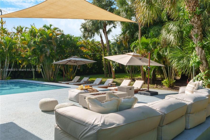 Beautiful single Family Home in a very good location, can be a fantastic primary / secondary house . Or can be an investors heaven as well. The house is located on 1 acre lot. You are living surrounded by the garden and opportunity to build two more single family homes, a beautiful guest house or up to 5 dwelling units. This house is fully furnished and finished. It has multiple opportunities to build extra income spaces or just enjoy the space. The area is Airbnb approved. So , if you are looking for a passive income opportunity , this could be the one. Virtual tour available.