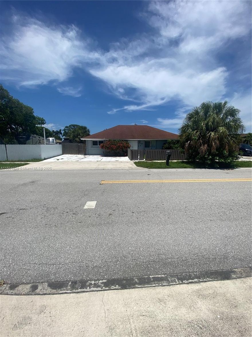Home is 5b 2b, 2511 sf, located near 95, Lantana Road and Lake Worth Road in Lake Osborne Heights. The 2 of the rooms are split with an open space which could be closed in, and could make it 7 bedrooms. . 
Roof Age is Unknown,  A/C is 2 years 5 months, Impact Windows and Doors installed 5 years ago. Needs some TLC.  NO appliances are included in the sale and the Seller has the right to remove any appliances pictured or in the home at time of showing or contract. Alarm systems, detectors and Extinguishers are excluded.