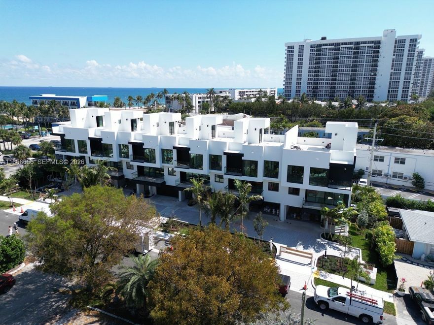 Welcome to Ocean Azul, an exclusive collection of six luxury townhomes in Pompano Beach, Florida. Experience the epitome of refined living with modern architecture, exquisite interiors, and breathtaking rooftop terraces. Ranging from 2498 to 2553 Sq Ft, each townhome offers spacious living areas, three bedrooms, three full bathrooms, one half bathroom, elevator and a two-car garage. Expected completion end of Q2 2026.