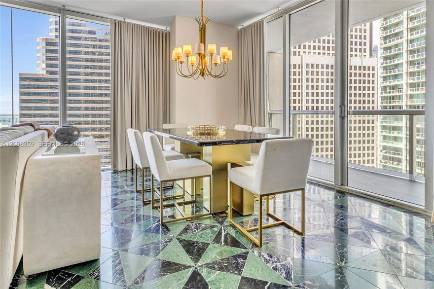 Located in the heart of Brickell, steps from Brickell City Centre and Mary Brickell Village, this 2BR/2BA corner unit at ICON Brickell Tower 3 offers stunning bay, river, ocean, and skyline views from the 25th floor. Floor-to-ceiling glass and a private balcony fill the space with natural light. Open living/dining area, modern kitchen with wood cabinetry, panel-ready refrigerator, and built-in appliances. Spacious primary suite with spa-style bath, soaking tub, and glass shower. Fully furnished and turnkey move-in or rent immediately. Short-term rentals allowed (Airbnb-friendly), ideal for investors or second home. Resort-style amenities include a 300-ft pool, spa, and 28,000 SF fitness center.