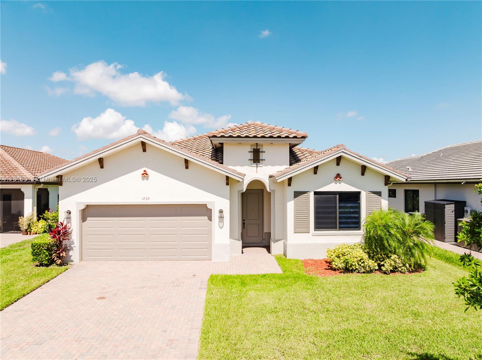 Newly built ranch-style home in the heart of Ave Maria! Features a grand entrance leading to an open- concept living area and entertainer's kitchen with oversize stone island and stainless appliances. Spacious primary suite with unsuited bath, bath soaking tub, shower water closet, and large walk-in closet. Two bedrooms share a Jack and Jill bath, plus a fourth bedroom ideal for an office or playroom, two-car garage, ample driveway parking, and open backyard. Enjoy resort-style amenities including clubhouse, pool, fitness center, and playground.