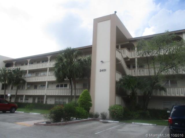 Great 2 bed 2 bath unit featuring a brand new ac unit, fresh paint, new carpet, an updated kitchen, new stainless steel appliances, new ceiling fans, dual sinks in the master bath, and a screened patio with garden and pool views. Wynmoor is a gated 55+ adult community featuring a theatre, classes & clubs, tennis courts, pickleball courts, a picnic and BBQ area, a business center, café, art room, a fitness center, multiple pools, and a golf course. Association req 20% down.