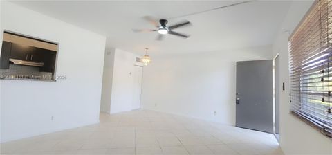 Photo of 304 NW 30th Ct #102, Pompano Beach, FL 33064 (MLS # A11831111)