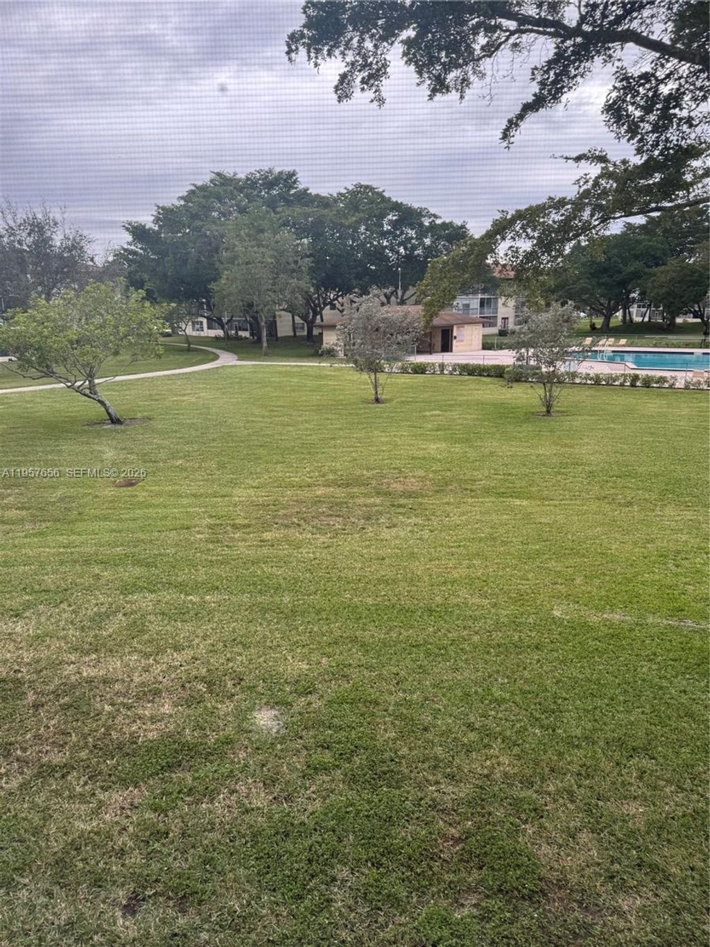 Photo of 200 SW 132nd Way #207L, Pembroke Pines, FL 33027 (MLS # A11957656)