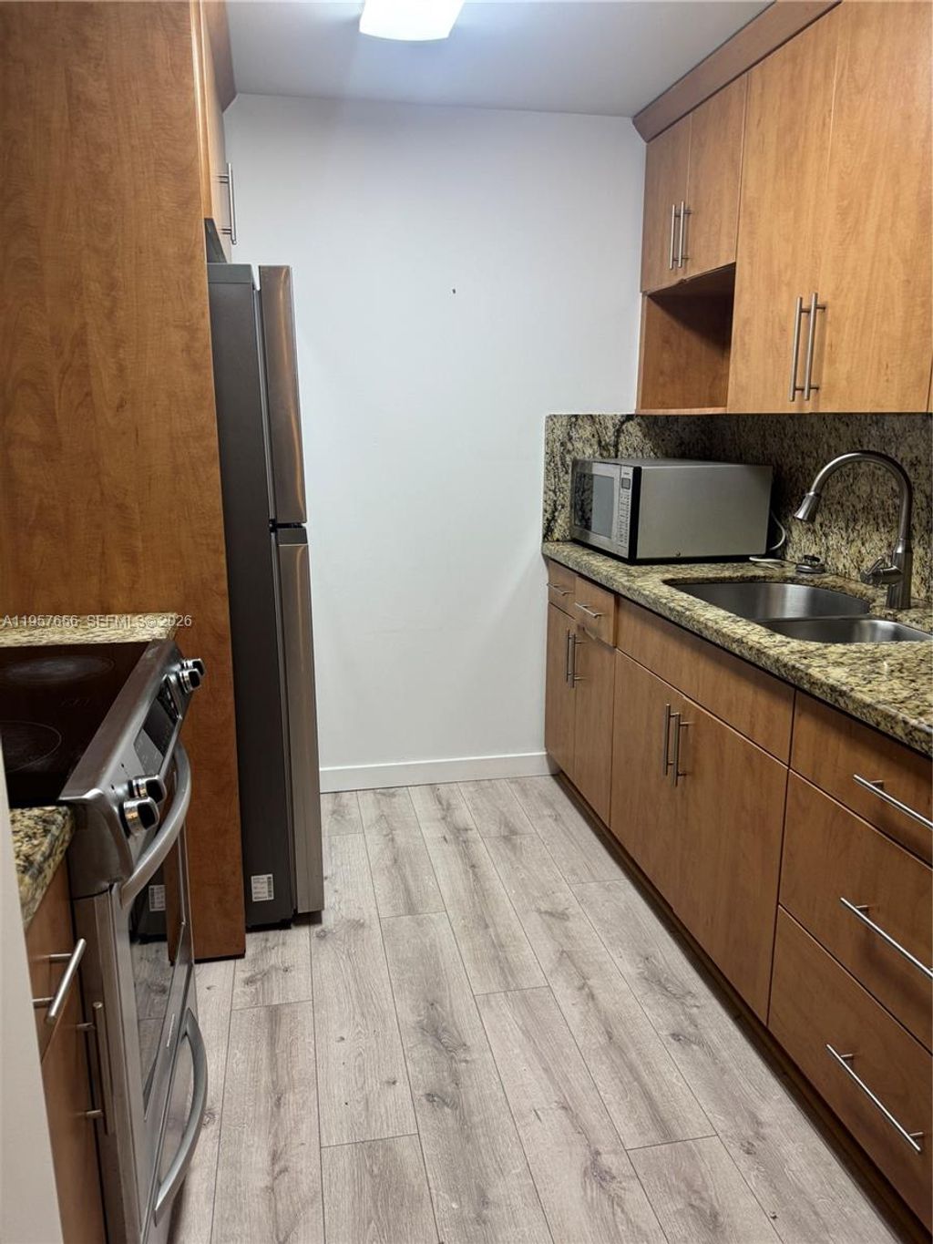 Photo of 200 SW 132nd Way #207L, Pembroke Pines, FL 33027 (MLS # A11957656)