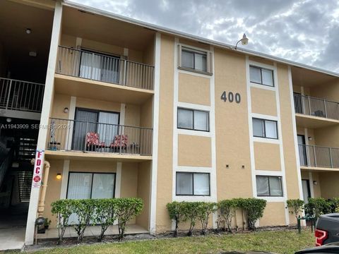 Photo of 400 Palm Cir W #104, Pembroke Pines, FL 33025 (MLS # A11943909)