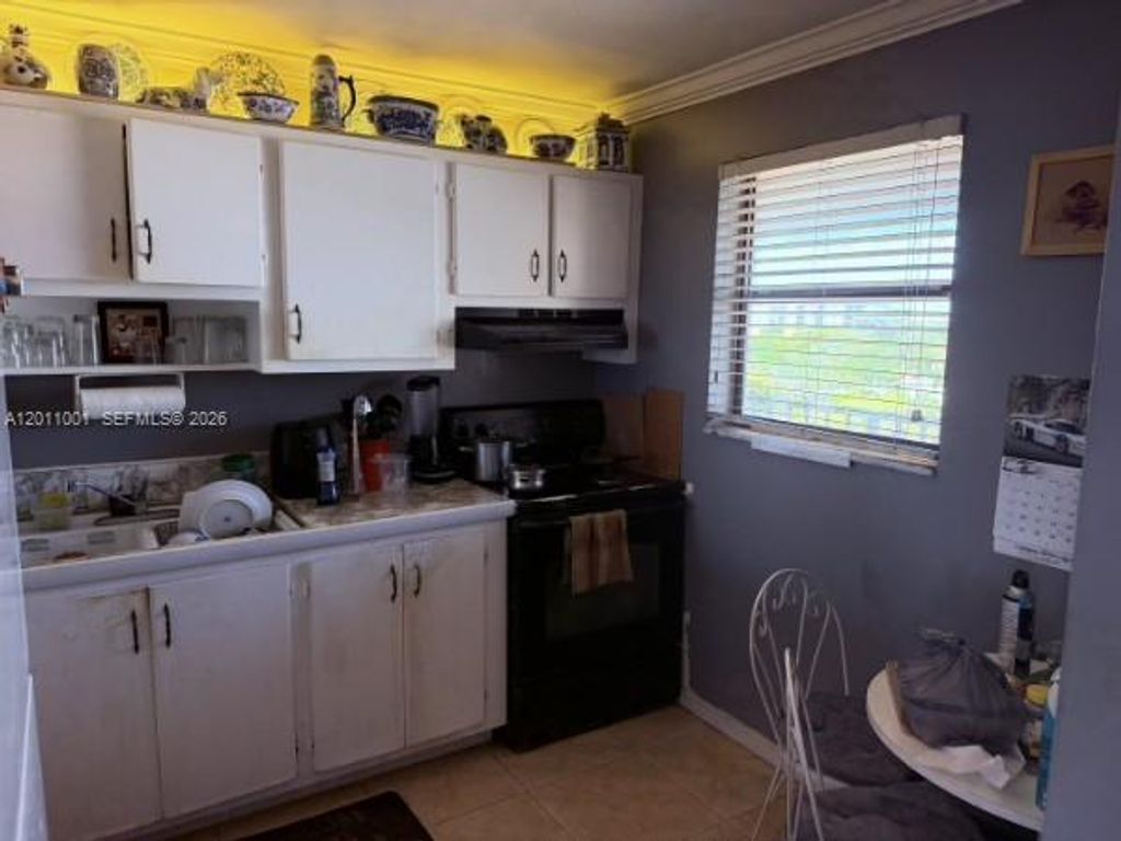 Photo of 2322 S Cypress Bend Dr #708, Pompano Beach, FL 33069 (MLS # A12011001)