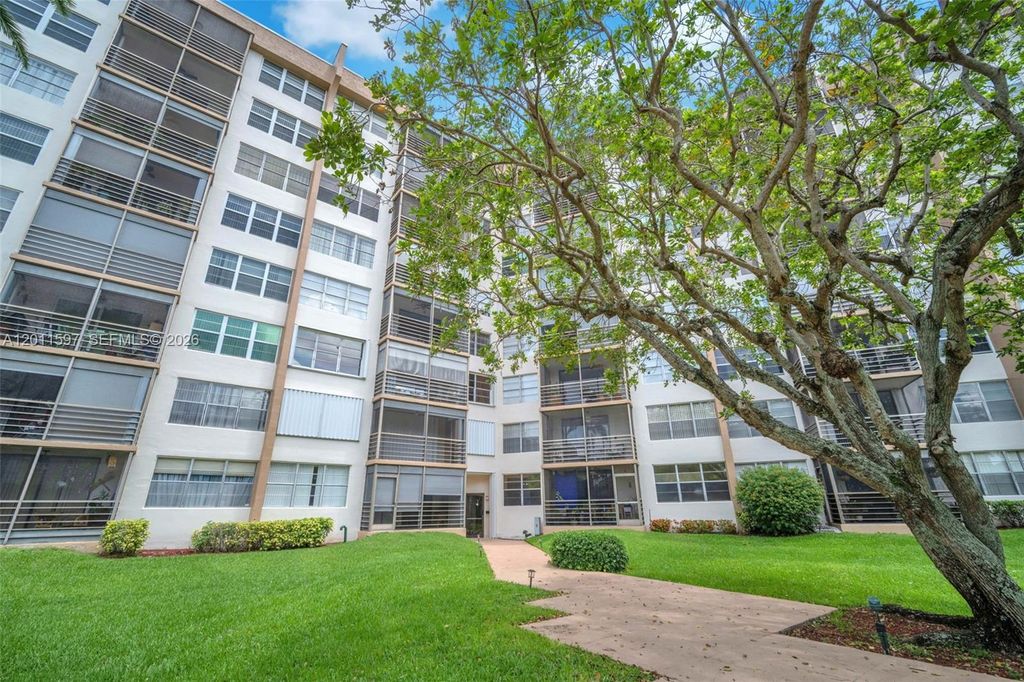 Photo of 1200 Saint Charles Pl #415, Pembroke Pines, FL 33026 (MLS # A12011597)