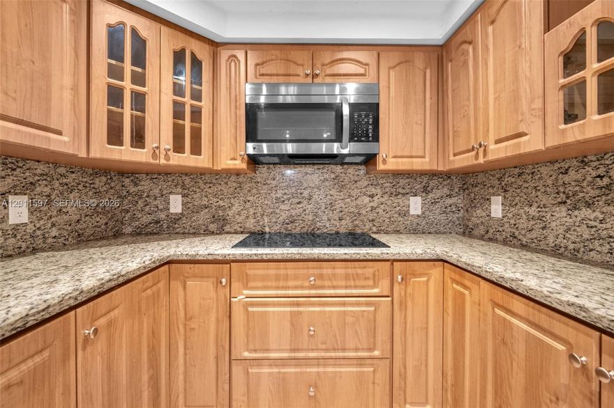 Retire in comfort in this spacious 2 bedroom condominium in the secured, residential resort community of Park Place; travertine floor tiles throughout; kitchen updated (2015); huge primary bedroom fits a king size bed plus more; two walk-in closets with closet systems for maximum storage; updated bathrooms; high impact bedroom windows; close to the elevators & laundry facility; residents & guests can enjoy recreational amenities such as pools, tennis courts, gymnasium, a game room, walking trails, etc.; Park Place is near shopping, medical facilities, restaurants, 2 int'l airports, ports, beaches & highways for easy commuting to Miami, Ft. Lauderdale & elsewhere. Buyers must have minimum 700 credit score & net income of 5 times the current condominium fee.