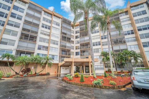 Photo of 1200 Saint Charles Pl #415, Pembroke Pines, FL 33026 (MLS # A12011597)
