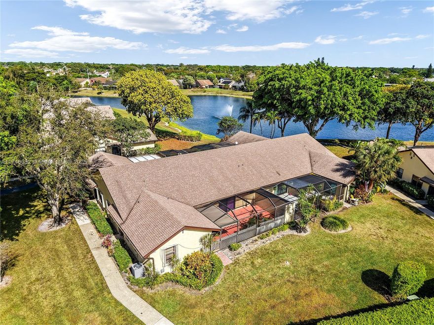 This beautifully upgraded villa offers a perfect blend of modern comfort and spacious living. Located on a private corner lot, the property boasts an open kitchen with newer appliances, elegant tile floors, and a large, dedicated laundry room. The split floor plan is ideal for privacy, with a generous master bedroom complete with a walk-in closet.
.
Step outside onto the expansive screened private patio, which overlooks a serene lake, providing the perfect setting for relaxation.
New Roof (2024).
667 sq ft patio

Set in a park-like community, this villa offers covered parking, a private storage locker, and all the amenities you could need. Don’t miss out on this exceptional opportunity—this one won’t last long!
(SELLER WILL PAY 3 MONTHS ASSOCIATION DUES FOR BUYER)