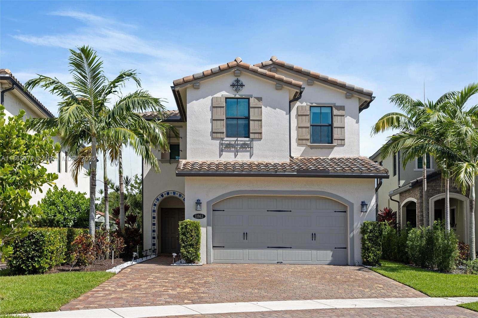 Gorgeous 2019 lakeside 4Bed/3Bath home on cul-de-sac in the coveted Raintree community. Enter foyer to 20’ ceiling & chandelier & marvel at a clear view of the lake. Open concept great area is filled with natural light & anchored with kitchen of white quartz, dark wood, countertop stove, wall ovens and SS GE Profile apps. Exotic center isle & huge pantry. Downstairs has bedroom & full bath & is finished with ceramic (wood) tiles. Upstairs has vinyl floors & very nice master with custom closet, lake view, double basins, soak tub & glass enclosed shower. Laundry is upstairs with wash tub & counter. Home has 2 car garage with epoxy floor, hanging racks, storage room & shelves. Driveway was extended to accommodate 3 cars. Screened lanai. Community heated pool, gym, events room & picnic area.