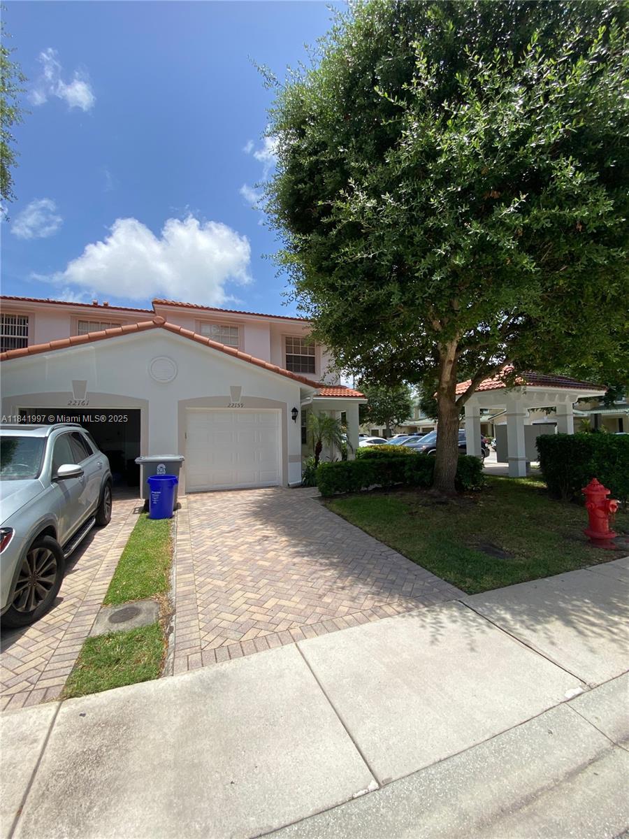 Charming Townhome at Royal Woods in luxurious Boca Raton. This well-maintained 3-bedroom, 2.5-bath Corner unit with one car garage is located in a quiet, gated community in West Boca Raton. Featuring a kitchen with stainless-steel appliances, granite countertops, internet wired, living room has built it surround sound and a private backyard. Spacious master with walk-in closets, new carpet upstairs in the bedrooms, new roof (2024), A/C (2022), a community pool and children's play area. Pet-friendly, A+ schools, and close to all essentials like grocery stores, restaurants, Veterans Park and more. A perfect home for comfort and convenience!