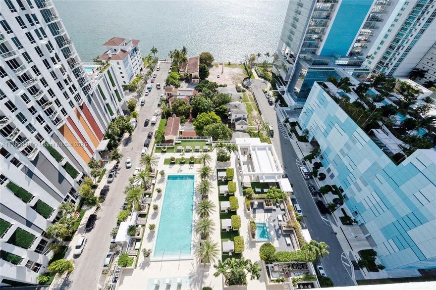 PRICE REDUCED! Stunning waterfront Luxury Oasis with Prime location Private Elevator and Breath taking views of the Biscayne Bay and Miami Beach. 3 Spacious Bedrooms and 3 Full Bathrooms. 2 Master Suites both with walking closets and water views. High End Italian Kitchen. Top of the line appliances. Expansive Terrace. East and West views. Walking distance to the most trendy Miami areas Miami Design District, Wynwood, Brickell, Miami Beach, Midtown. Steps to Starbucks, Restaurants, shops, Banks and Groceries. Stunning Pool, Spa and Social areas, updated Gym, yoga room, Concierge and luxury living. This is the Place to be
