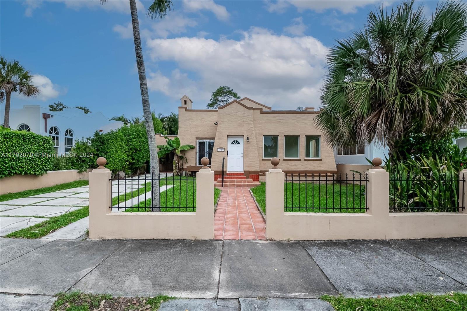 This 1925 Old Spanish-style gem in Miami's desirable Silver Bluff neighborhood combines timeless charm with boundless potential. The property boasts a 3-bed, 2-bath main house & a nearly 800 sqft 2 bed/1 bath cottage, each w/ a kitchen, laundry area, & ample closets, totaling 2,595 sqft on a 6,750-sqft lot. Classic details include hardwood floors, a Florida Room, a balcony w/ intricate tilework, & a cozy fireplace, ready for restoration. The backyard offers a private retreat for relaxing/entertaining & long driveway with a tiled carport. Ideally located near Coconut Grove, Coral Gables, Brickell, the Underline, and just blocks from Biscayne Bay, Vizcaya, & Key Biscayne, this home is a rare opportunity to create your dream residence in one of Miami's most coveted areas.