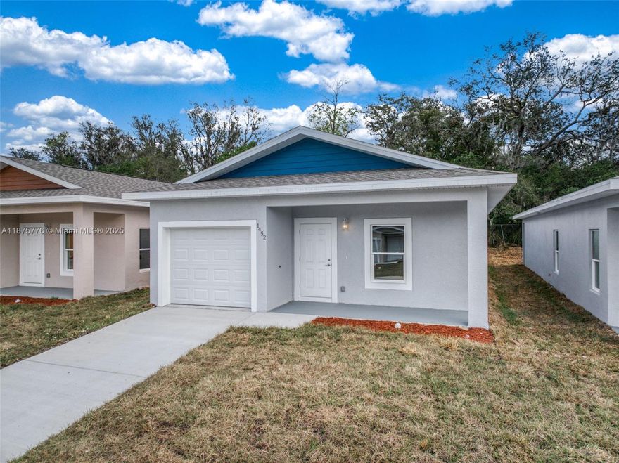 NEW CONSTRUCTION 2025 CONCRETE BLOCK IN SEBRING FLORIDA. MOVE IN READY -3/2 WITH GARAGE IN A GATED COMMUNITY. Swimming pool, spa, play area, electric gates and dog park. Vinyl floor throughout, A/C and ceiling fans, high 9.4 ft ceilings, surge protectors. Walk in closet and linen cupboard. This home benefits from a private driveway and garage, main sewer (not septic), recessed lighting, 4 x stainless steel appliances including a double-door fridge freezer, microwave, stove oven range and dishwasher. Soft-close high quality kitchen cabinets, a large master bedroom with double sinks in bathroom and large walk in closets. Close to local amenities, schools and hospitals. 1.5 hours from Tampa, 2.5 hours from Miami, 1.2 hours from Orlando. Florida Sun.