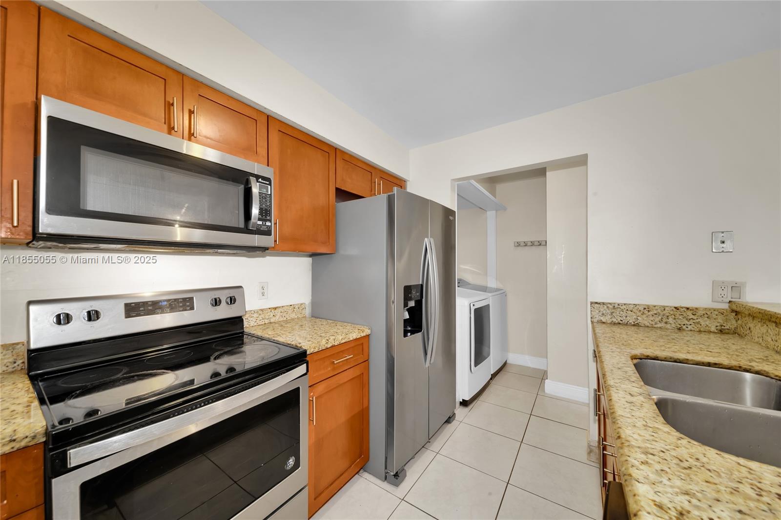 Welcome to this impeccably updated 3-bedroom, 2.5-bath townhome, perfectly situated in the heart of Miramar's exclusive Woodscape Community. With easy access to the Turnpike and I-95, this unit's prime location also places you right in front of the community pool and tennis courts. This spacious gem offers a lifestyle of convenience and luxury with features such as a stylishly renovated main suite, HUGE closets, lavish bathrooms, and upgraded kitchen with all stainless steel appliances. The open-concept family room and kitchen seamlessly flow a fenced patio overlooked by a private balcony, providing an ideal setting for entertaining or just relaxing. Don't miss an opportunity to make this fabulous townhouse your home! Schedule a viewing today.