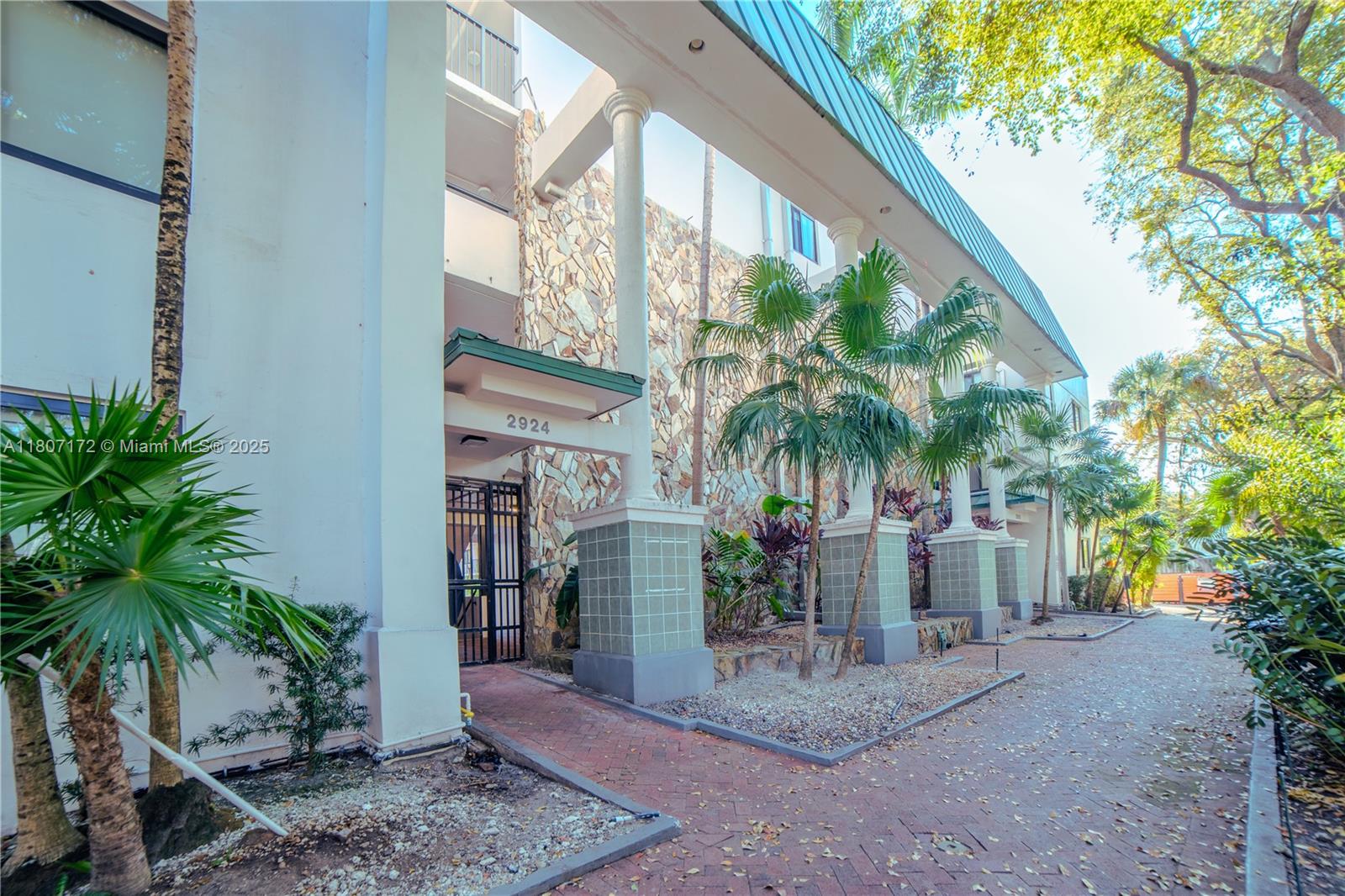 Discover the charm of this 2-bedroom penthouse in a rare, iconic grove, 4-story building with a unique two-wing design penthouse, offering unparalleled privacy and a sense of community. Enjoy tranquility, unbeatable views, and natural light in this recently updated vintage building to modern strength and safety standards. With a prime location near CocoWalk, you'll be surrounded by vibrant restaurants, shops, and cultural attractions. Experience the best of Coconut Grove's eclectic mix of art, food, and music. Come home to a unique, original grove style penthouse. Contact me today to schedule a viewing!