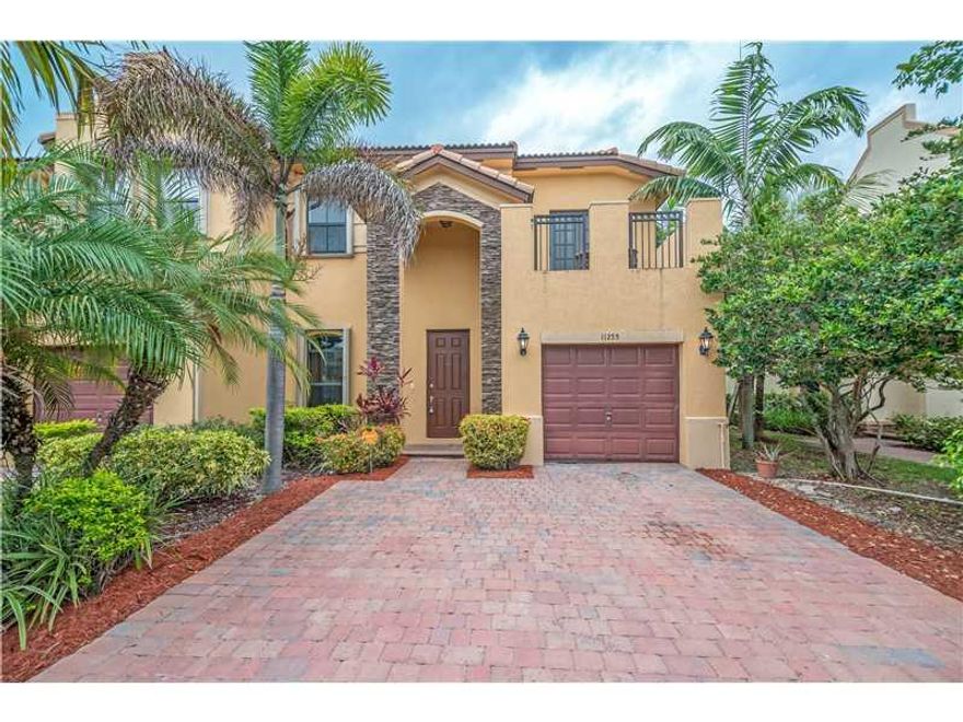 Largest 3 bedroom corner lakefront townhouse in gorgeous Lennar community! Model no longer available thru builder! Freshly painted! Loaded with upgrades. 1st floor tile/carpet 2nd. Spacious master suite features lake view,his/hers closets,dual sinks,Roman  tub/separate shower. Private balcony on 2nd floor! Large kitchen has wood cabinets, stainless steel appliances, snack counter. Upstairs laundry. Accordion shutters, garage, alarm. Spectacular ammenities include pool, play grounds, fitness center & more!