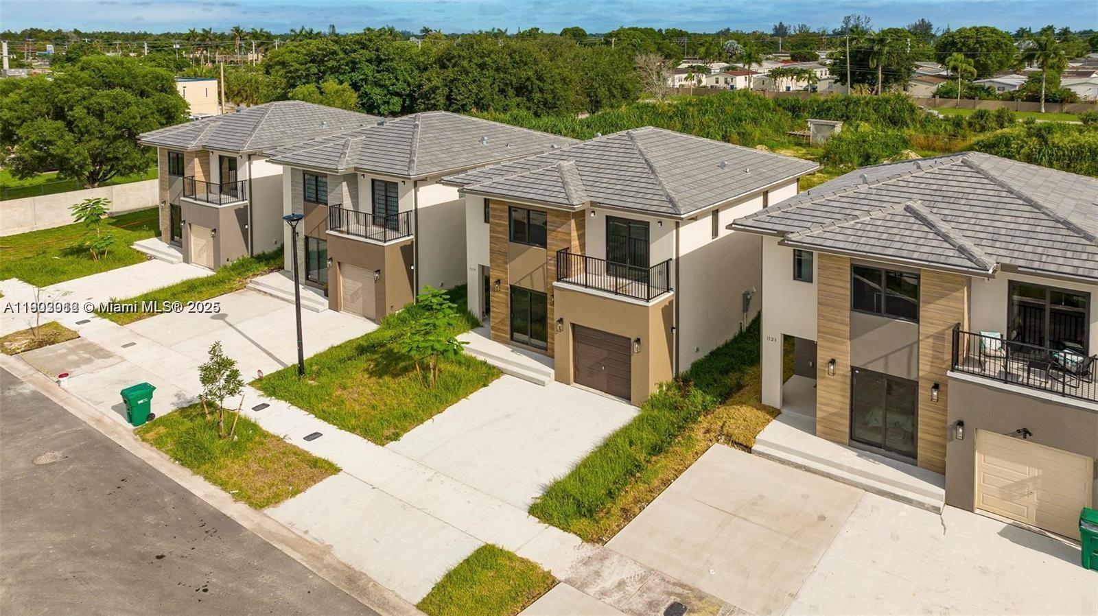 Stunning 5 bedroom /4.5 bathroom single family home located on
a PREMIUM LOT without any rear neighbors in the Aurora Community, one of Miami's most sought-out
communities. COMPLETE HIGH IMPACT WINDOWS. This exquisitely new home features an open concept with a beautiful chef's kitchen featuring high hat
lighting, quartz countertops, & premium stainless steel appliances. Conveniently equipped with a bedroom &
private full bathroom on 1st floor. Bathrooms have been luxuriously remodeled. Front load washer & dryer
included. Located near the Baptist Hospital, Homestead Air Reserve Base, Turkey Point & Amazon's centers. Easy
access to the turnpike. This home is a MUST SEE! Call now for a private showing.