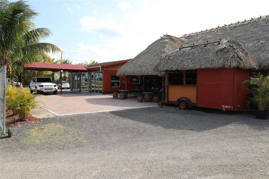 This property sits on 5 acres located in the fertile Redlands of Homestead, FL with an additional two structures in an indoor covered area. This turnkey facility offers the ability to operate as a party venue, shows, and recreational weekend getaways. Inventory will be ready when negotiating which includes all structures, and equipment—very vast parking spaces inside and outside of the establishment. Also, the business has various animals the family can interact with while having a good time. Very profitable and it is the closest entertainment location close to the West Kendall area