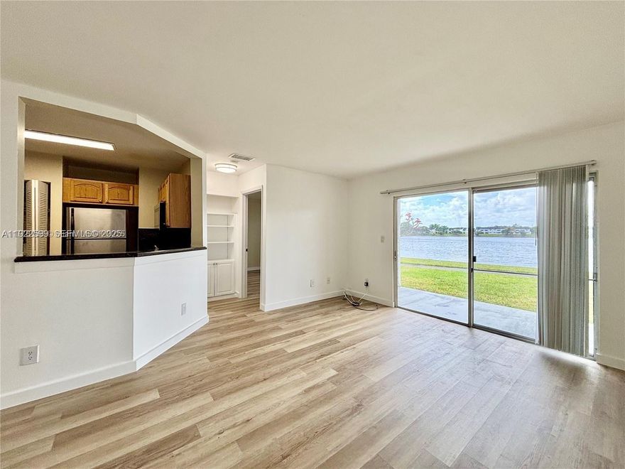 Bright and spacious 1st floor apartment in gated community. Full size washer and dryer in unit. Amazing lake view from living room. Vacant and easy to show.