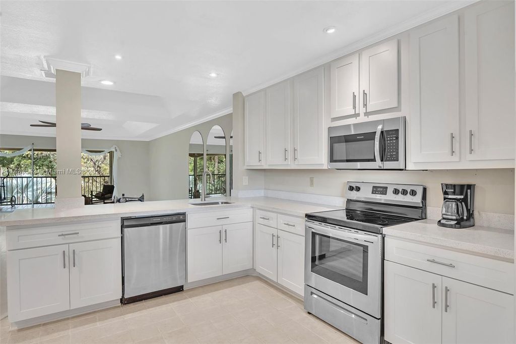 Photo of 13335 Touchstone Pl #203, West Palm Beach, FL 33418 (MLS # A11433543)