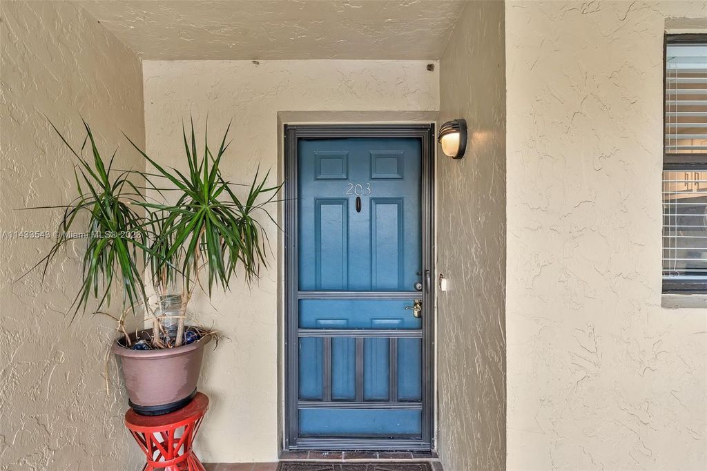 Photo of 13335 Touchstone Pl #203, West Palm Beach, FL 33418 (MLS # A11433543)