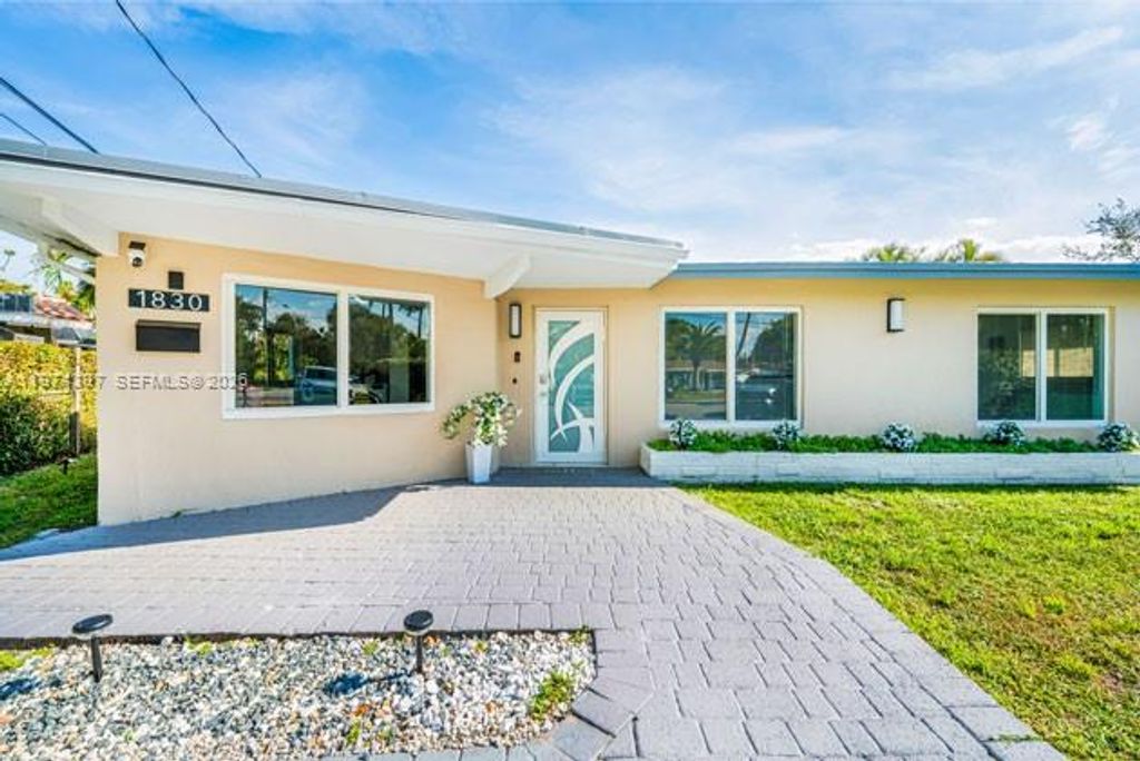 Photo of 1830 NW 32nd St, Oakland Park, FL 33309 (MLS # A11974397)