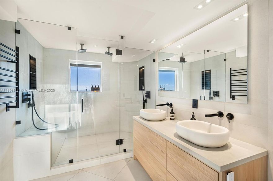 Full Renovation JUST Completed (Fall 2025) No assessments - Healthy reserves. Discover unparalleled luxury in this designer-renovated corner unit, crafted with no expense spared. Ocean Front with Boat Slips Available. Featuring impact sliding doors and abundant natural light. Enjoy ocean sunrises and city skyline sunsets from two balconies. The open layout with split bedrooms provides privacy and spaciousness. This boutique-style building offers quick elevator access, above ground valet + premium SELF parking space, beach club, tennis courts, a private marina, and exclusive dining. Great walkability. Showings are easy. Assigned Premium Parking & AC Storage. **Partially furnished**