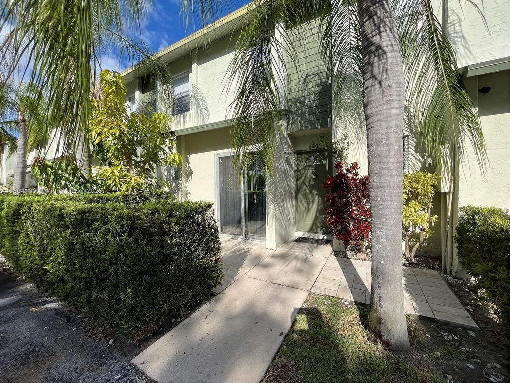 Photo of 843 Crystal Lake Dr, Deerfield Beach, FL 33064 (MLS # A11804109)