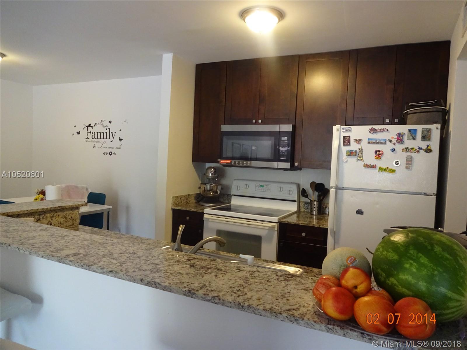 Bright 2Bed/1Bath Condo at The Hammocks at Kendall. Updated wood Kitchen cabinets with granite counter-tops. Tile floors. Storage. Washer and Dryer inside the unit. Enjoy all The Hammocks Community Amenities: Club House, Tennis Courts, Pool and more.Great location close to A+ Schools, Baptist Hospital, Restaurants and Shopping Centers.