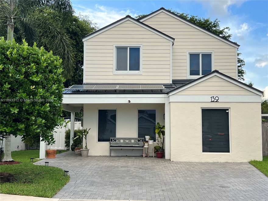 Beautiful totally remolded and energy efficient  4 Bedrooms, 2.5 baths, single family home in Hampton Lakes with canal views and no rear neighbors. NEW METAL ROOF (2024), NEW FULL IMPACT WINDOWS/DOORS (2024), 18 SOLAR PANELS (2024). Monthly electric bill average $25) and NEW A/C (2025).
The kitchen offers white quartz countertops and equipped with high end stainless steel appliances, matching hood over the range and cabinets are high quality white shaker cabinets. 
Open floor plan with stylish durable luxury vinyl plank flooring. Relax in the oversized screen patio which provides peaceful views of the canal.
Enjoy Hampton Lakes peaceful living with a community pool, desirable A+ Weston Elementary & Middle schools. Walking distance to Walgreens, supermarket, restaurants, shops and more!