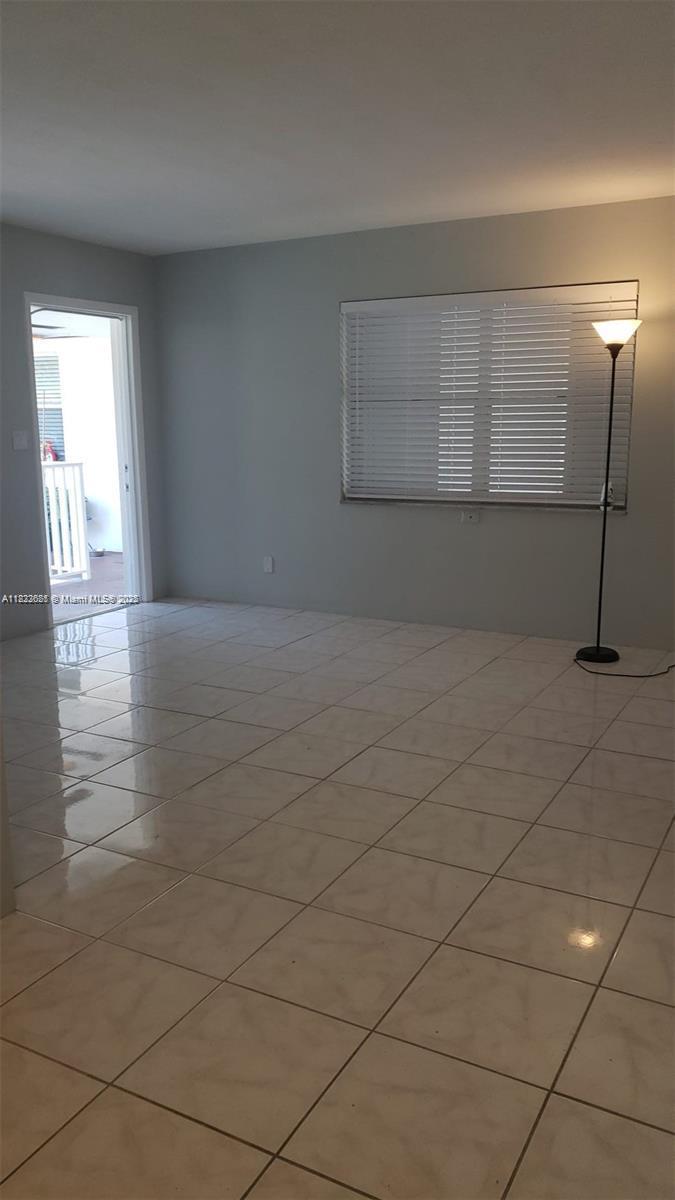 Spacious corner unit. Features One Bedroom -One Full Bathroom. kitchen, bathroom. Very bright. Tile flooring throughout, laundry facilities in the building, and 1 parking space. Excellent location, close to shopping, minutes from Young Circle, the beaches, Downtown Hollywood, the airport, and major roads. Please read brokers remarks.