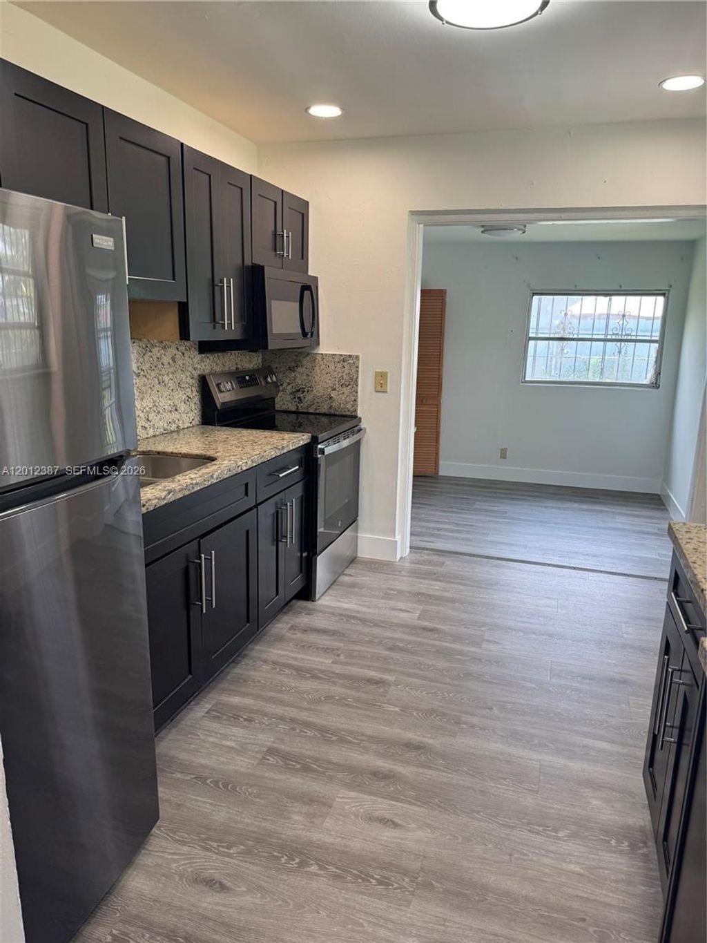 Photo of 2620 SW 53rd Ave, West Park, FL 33023 (MLS # A12012387)