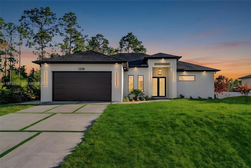 Beautiful new construction. This property offers 1,600 sq ft of living area with a modern, functional layout.
Featuring 3 bedrooms plus a den/office, 2 full bathrooms with glass shower doors, and 11-foot ceilings that enhance natural light and create an open, airy feel throughout the home.
The property includes custom closets, installed blinds, and contemporary finishes. The kitchen and living areas are designed for comfort and everyday functionality.
Exterior highlights include a spacious covered outdoor area with a built-in grill, ideal for entertaining.
Move-in ready and conveniently located in a growing area of Lehigh Acres.