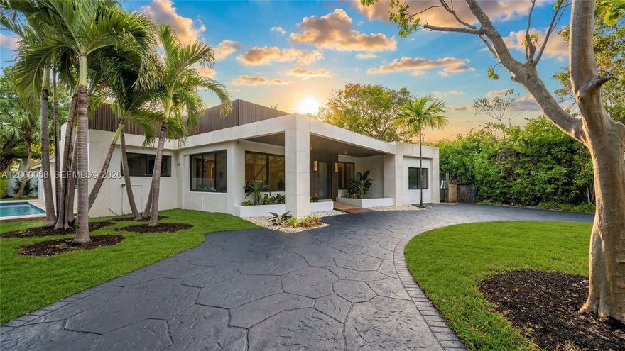 Located within the exclusive gated community of Keystone Island, this fully renovated residence is a true architectural statement, masterfully designed by Tamara Feldman. Offering 6 bedrooms and 5.5 bathrooms, including a separate maid’s quarters, the home blends refined design with exceptional functionality.

The interiors showcase a warm, contemporary aesthetic, featuring high-end materials, custom millwork, and elegant wood accents throughout. Soaring vaulted ceilings with exposed beams, combined with multiple skylights, flood the home with natural light and enhance the sense of volume and openness.

The chef’s kitchen is appointed with premium finishes and custom cabinetry, seamlessly flowing into the main living areas. Expansive living spaces are framed by clean architectural lines and curated textures, creating a cohesive and sophisticated environment throughout.

The primary suite offers a serene retreat with bespoke detailing, generous closet space, and a spa-inspired bathroom designed with premium stone and refined finishes. Each additional bedroom is thoughtfully designed, offering comfort, privacy, and flexibility for family or guests.

Outdoors, a beautifully designed pool area provides a private oasis, ideal for both relaxation and entertaining. The landscaped grounds and seamless indoor-outdoor flow enhance the overall living experience, creating a true South Florida lifestyle.